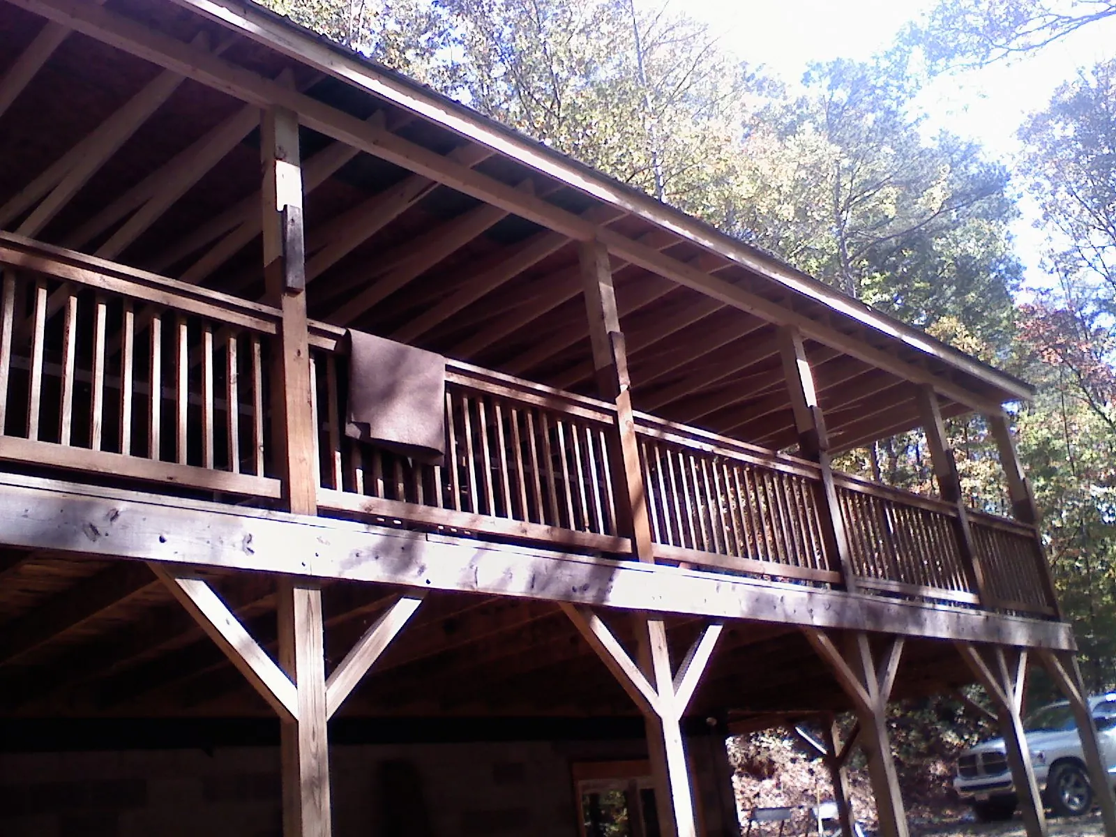 Timber framing under a new elevated porch and deck — Roof Leak Repair in Granite Quarry by Roofing Brothers